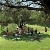 Residents participating in Yoga in the greenbelt