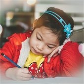 Girl writing a letter