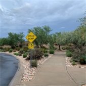sidewalk area where rip rap is preventing erosion
