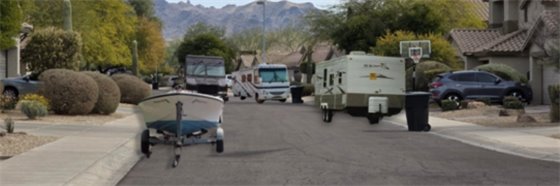 street full of boats and RVs