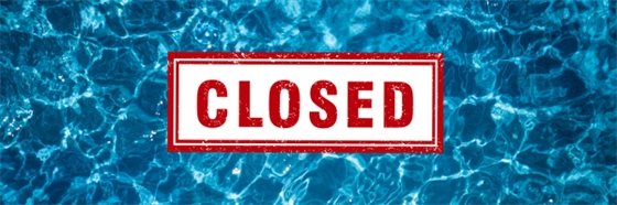 blue water with closed sign in red