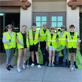 volunteers in vests ready to pick up trash
