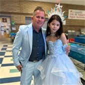 Dad and daughter in blue dress attire