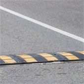 temporary black and yellow speed bump