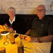 couple at holiday party table