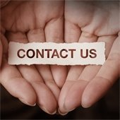 hands holding a piece of paper that says "contact us"