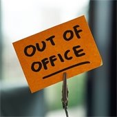 out of office written on a piece of paper