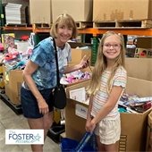 woman and girl holding bags
