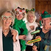 women in photo booth