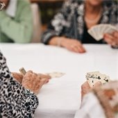 ladies at a table playing bridge