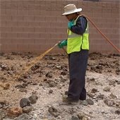 Man spraying pre-emergent